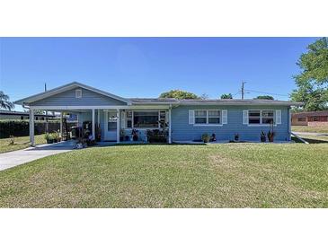 Charming single-story home with well-maintained lawn and inviting curb appeal at 1803 Fredricksburg Ave, Lakeland, FL 33803