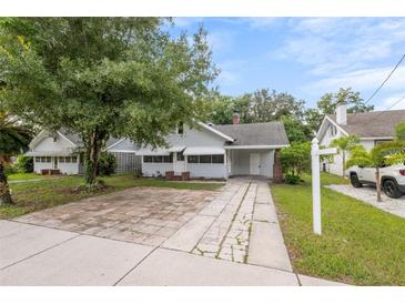 Charming bungalow with a spacious front yard at 450 Avenue B Ne, Winter Haven, FL 33881