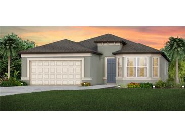 Single-story home with neutral siding, two-car garage, and landscaped lawn at 4464 Sw 84Th Street Rd, Ocala, FL 34476