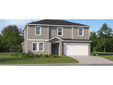 Two-story house with gray siding, white garage door, and landscaping at 776 Osprey Roost Dr, Lakeland, FL 33801