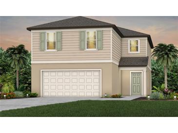 Two-story house with light beige siding, a neutral-toned door, and a two-car garage at 264 Woodsage Pl, Lake Alfred, FL 33850