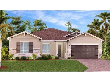 One-story home with brown roof, stone accents, and a two-car garage at 754 Terrapin Dr, Debary, FL 32713