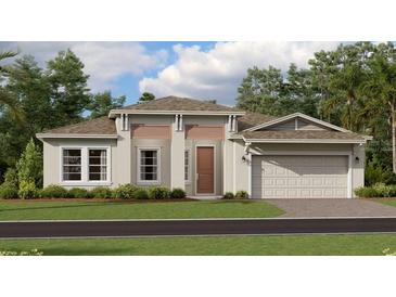 One-story home with a two-car garage, light beige exterior, and landscaping at 4807 Waltham Forest Dr, Davenport, FL 33837