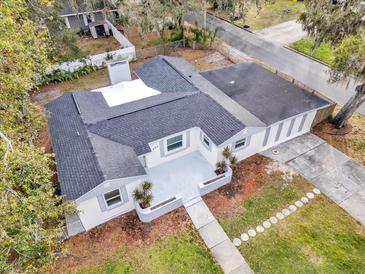 Aerial view of a house and surrounding neighborhood at 803 E Valencia St, Lakeland, FL 33805