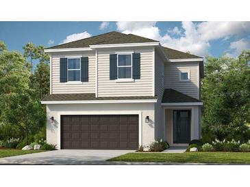 Two-story house with dark brown garage door and light beige siding at 5721 Gingham Dr, Kissimmee, FL 34758