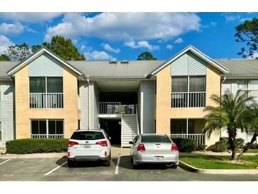 Well-maintained condo building with ample parking and landscaping, close to local amenities at 101 Bent Tree Dr # 12, Daytona Beach, FL 32114