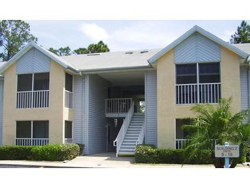 Charming condo building exterior featuring well-maintained landscaping and inviting entrances at 101 Bent Tree Dr # 12, Daytona Beach, FL 32114