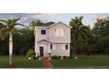 Charming two-story home with a well-manicured lawn and beautiful landscaping at 1832 Bright Sky Dr, Kissimmee, FL 34744