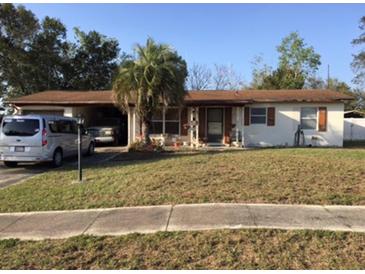Charming single-story home features a well-kept lawn and mature landscaping at 894 Superior St, Deltona, FL 32725