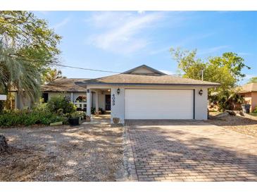 Charming single story home with well-maintained yard and a two car garage at 4089 Lehman Ln, Lakeland, FL 33813