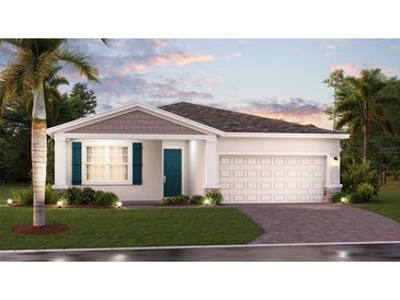 Charming single-story home featuring a manicured lawn, vibrant landscaping and a two-car garage at 1893 Clear Sky Dr, Kissimmee, FL 34744