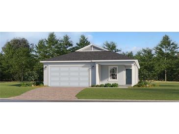Charming single-story home featuring a symmetrical design, attached garage, and well-maintained front lawn at 4566 Ochos Rios Pl, Kissimmee, FL 34758