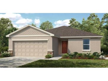 Charming single-story home showcasing a classic design with a well-manicured lawn and inviting entrance at 2430 Slippery Rock St, Auburndale, FL 33823