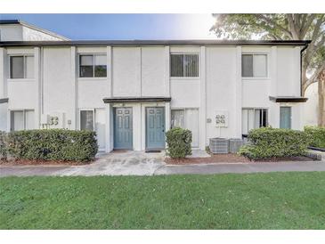 Charming multi-Gathering home featuring a well-maintained lawn and exterior at 4215 S Semoran Blvd # 3, Orlando, FL 32822