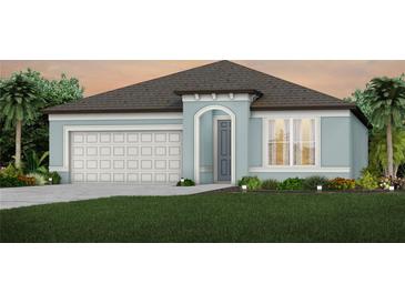Charming single-story home with blue exterior, two car garage, and manicured landscaping at 8953 Wildlight Trl, Wildwood, FL 34785