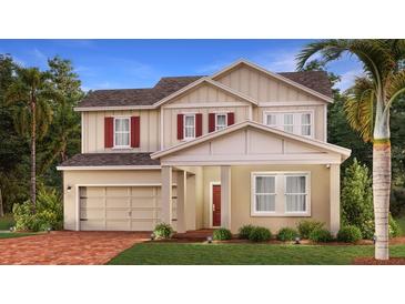 Charming two-story home with brick paved drive and red shutters at 698 Peroni Ave, Debary, FL 32713