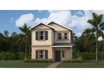 Charming two-story home with neutral toned siding, black shutters and a neatly landscaped front yard at 2934 Haze Rd, Clermont, FL 34714