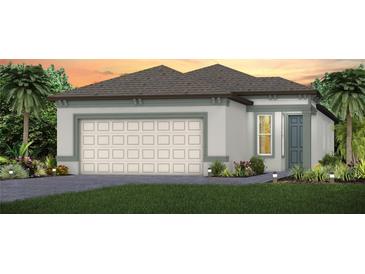 Charming home with a two-car garage, neutral color palette and front yard landscaping at 5844 Sw 87Th Ave, Ocala, FL 34481