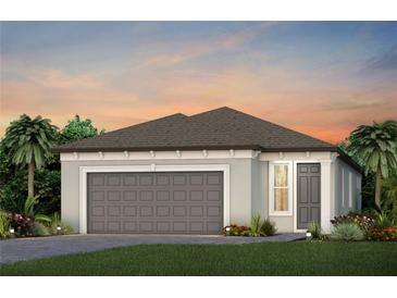 Charming single-story home featuring a two-car garage and a well-maintained lawn with landscaping at 5832 Sw 87Th Ave, Ocala, FL 34481