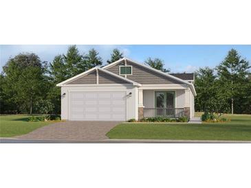Charming single-Gathering home with a two-car garage, stone accents, and a covered front porch at 4572 Ochos Rios Pl, Kissimmee, FL 34758