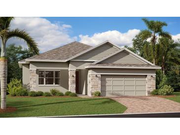 Charming single-Gathering home featuring a two-car garage, stone accents, and lush landscaping at 1283 Dora Parc Ln, Mount Dora, FL 32757