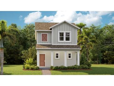 Charming two-story home with a landscaped yard and covered front porch offers curb appeal at 608 Terrapin Dr, Debary, FL 32713