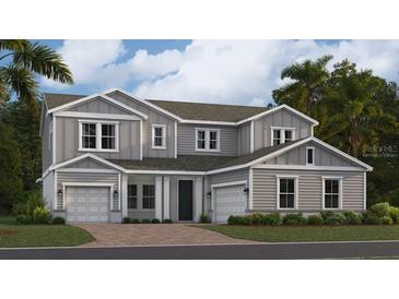 Stunning two-story home with attached garages, neutral colors, lush landscaping, and inviting curb appeal at 2251 Rider Rain Ln, Apopka, FL 32703