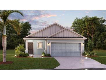Charming single-Gathering home featuring a two-car garage, manicured lawn, and tidy landscaping at 5611 Vinyasa Rd, Clermont, FL 34714