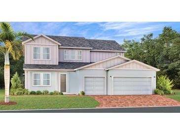 Charming two-story home featuring a spacious two-car garage and nicely landscaped front yard at 5660 Vinyasa Rd, Clermont, FL 34714