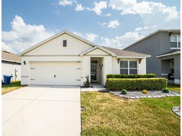 Charming single-story home with a well-maintained lawn and inviting curb appeal at 3017 Country Club Cir, Winter Haven, FL 33881