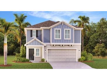 Charming two-story home showcasing a modern design, attached garage, and lush landscaping at 5621 Gingham Dr, Kissimmee, FL 34758