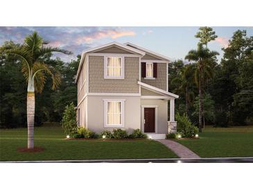 Charming two-story home with a landscaped front yard and a welcoming front porch at 2437 Spring Tune Aly, Kissimmee, FL 34744