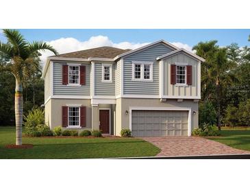 Charming two-story home with a two-car garage and well-maintained landscaping at 2507 Peace Of Mind Ave, Kissimmee, FL 34744