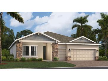 Inviting single-story home featuring stone accents, neutral colors, well-manicured lawn, and an attached two-car garage at 2155 Rider Rain Ln, Apopka, FL 32703