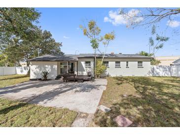 Spacious backyard featuring a concrete patio perfect for outdoor entertaining and relaxing at 2800 E Anderson St, Orlando, FL 32803