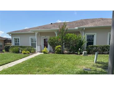 Charming single-story home featuring a well-maintained lawn and inviting curb appeal at 314 Lake Butler Dr, Kissimmee, FL 34759