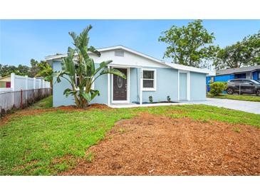 Charming single-story home with a well-maintained lawn and fresh landscaping in a quiet residential neighborhood at 1022 Baycrest Dr, Lakeland, FL 33805
