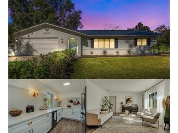 Charming ranch house with a freshly painted exterior and updated landscaping at 1105 E Ohio Ave, Deland, FL 32724