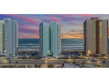 Oceanfront building with sunset view; resort-style amenities at 3047 S Atlantic Ave # 1906, Daytona Beach, FL 32118