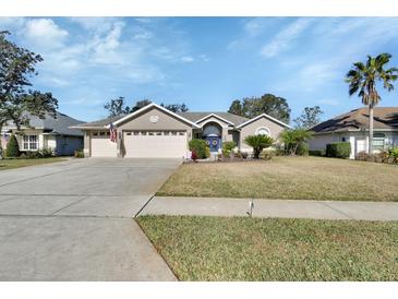 Charming single-story home with a well-manicured lawn and inviting curb appeal at 428 Hightower Dr, Debary, FL 32713