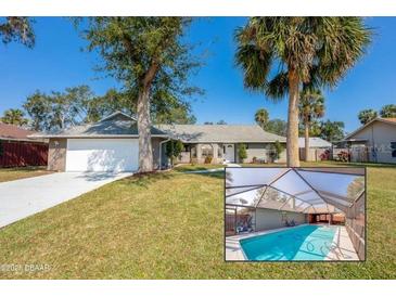 Charming single-story home with a two-car garage, well-manicured lawn, and screened-in pool area visible in the foreground at 709 Lone Oak Dr, Port Orange, FL 32127