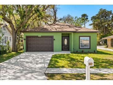 Charming single-story home with a well-maintained lawn, fresh landscaping and a private drive at 226 N Frederick Ave, Daytona Beach, FL 32114