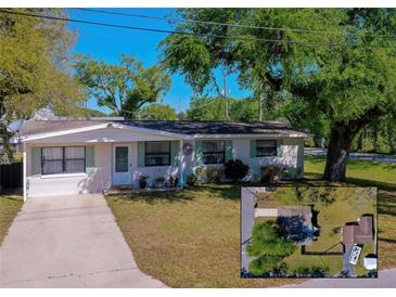 Charming one-story home featuring a well-maintained lawn, complementing the property's inviting curb appeal at 501 Powers Ave, Port Orange, FL 32127