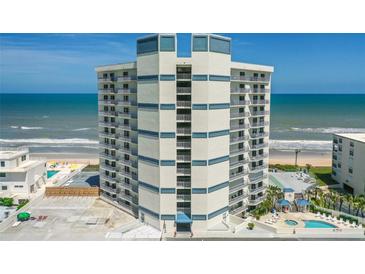 Beautiful oceanfront condo building featuring private balconies and luxurious amenities at 5207 S Atlantic Ave # 723, New Smyrna Beach, FL 32169