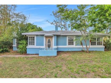 Charming blue single-story home with a landscaped front yard and light-colored trim at 263 Seaview Ave, Daytona Beach, FL 32118