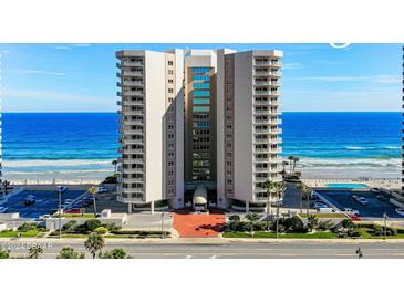 Oceanfront condo building with private balconies offering stunning views of the beach and Atlantic Ocean at 2967 S Atlantic Ave # 1404, Daytona Beach, FL 32118
