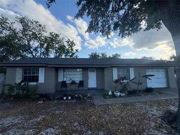 Charming single-story home with a well-maintained front yard and a welcoming entrance at 2219 Howland Blvd, Deltona, FL 32738