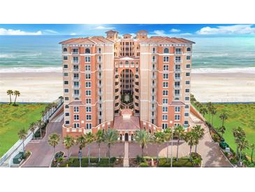 Stunning oceanfront condo building with a private beach access and manicured landscaping at 3245 S Atlantic Ave # 304, Daytona Beach Shores, FL 32118