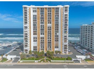 High-rise condo complex on a clear, sunny day with ocean views and beach access at 3003 S Atlantic Ave # 17A1, Daytona Beach Shores, FL 32118