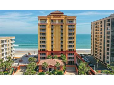 Stunning exterior view of a beachfront condo complex with beautiful architecture and ocean views at 2901 S Atlantic Ave # 401, Daytona Beach Shores, FL 32118